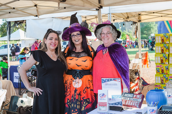 Three women in costumes
